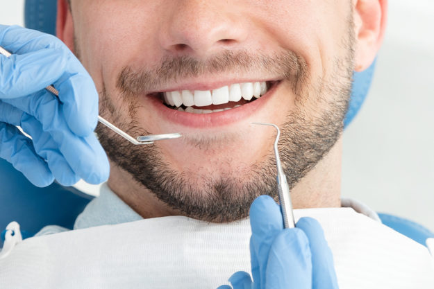 dental health services man getting dental health services