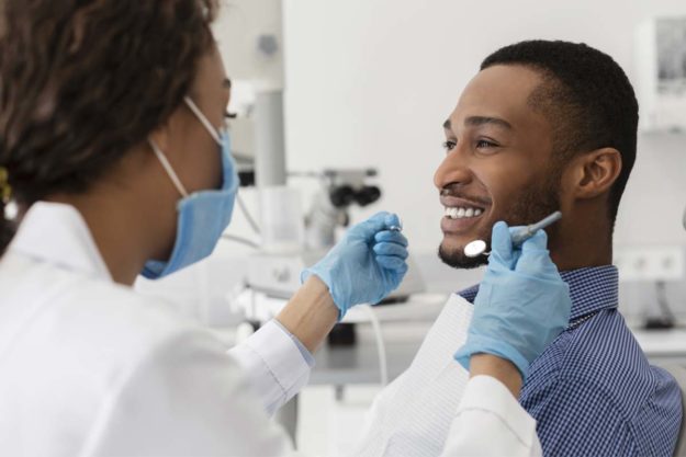 dental-implant-surgery man getting dental implant surgery