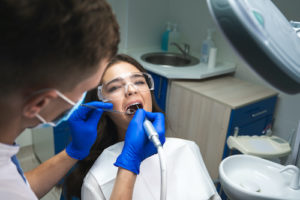 girl who is getting a tooth extraction