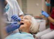 woman undergoing tooth extraction preparation