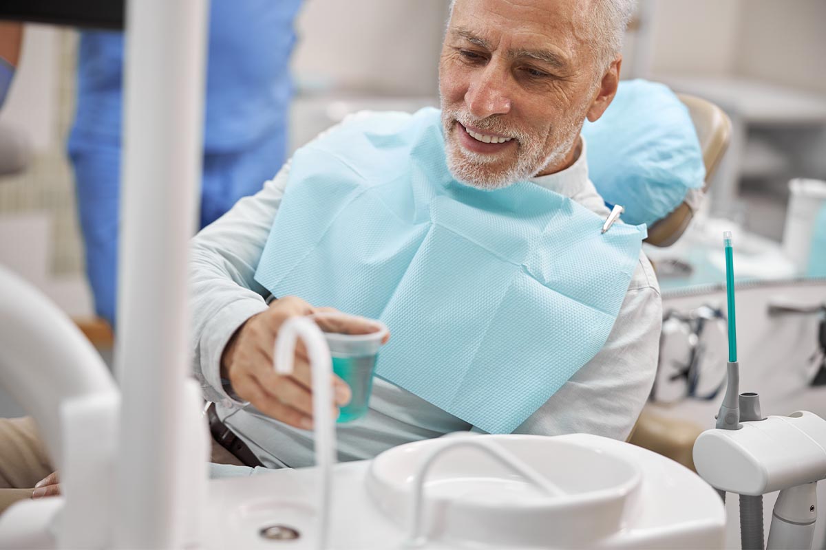 benefits-of-fluoride man thinking about the benefits of fluoride