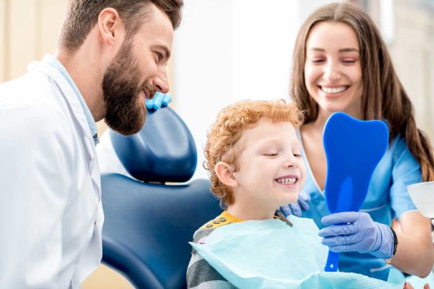 How-to-Choose-a-Pediatric-Dental-Office parents learning how to choose a pediatric dental office
